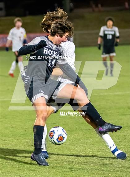 Thumbnail 3 in New Hanover vs. Hough (NCHSAA 4A Final) photogallery.