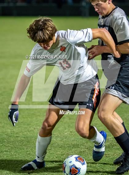 Thumbnail 2 in New Hanover vs. Hough (NCHSAA 4A Final) photogallery.