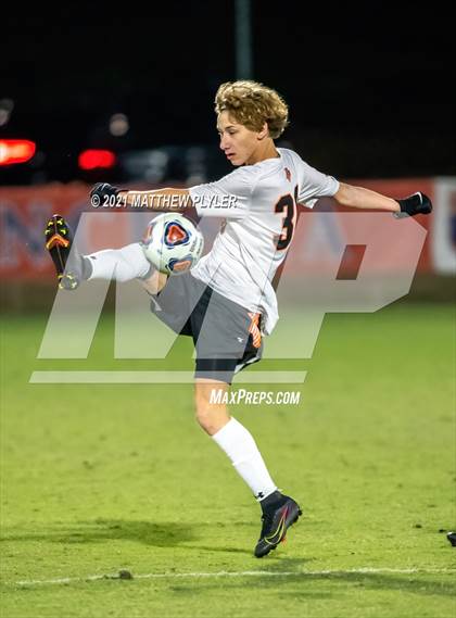 Thumbnail 3 in New Hanover vs. Hough (NCHSAA 4A Final) photogallery.