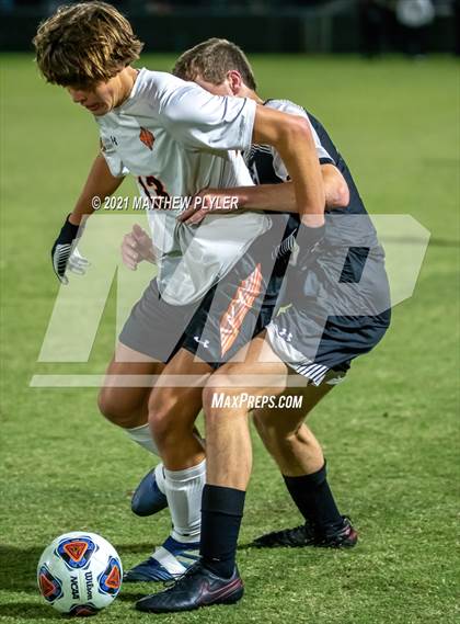 Thumbnail 2 in New Hanover vs. Hough (NCHSAA 4A Final) photogallery.