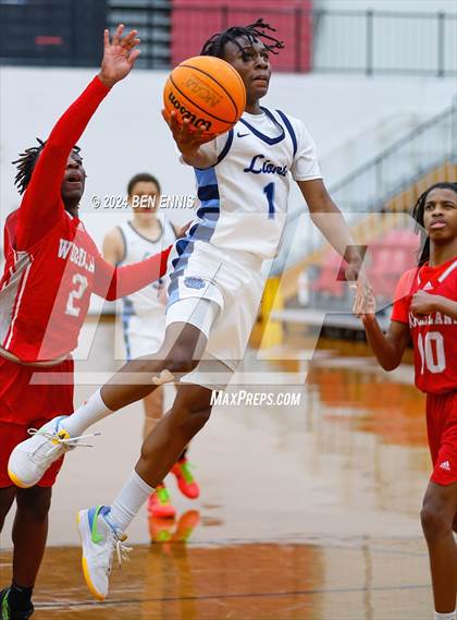 Thumbnail 1 in Lovett vs. Woodland (Region 5-AAAA Tournament) photogallery.
