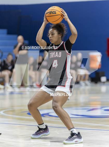 Thumbnail 3 in Triad vs Marquette Catholic (Columbia Tip Off Tournament) photogallery.