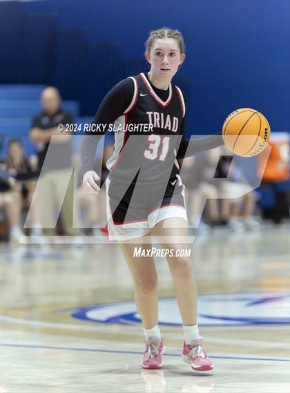Thumbnail 2 in Triad vs Marquette Catholic (Columbia Tip Off Tournament) photogallery.