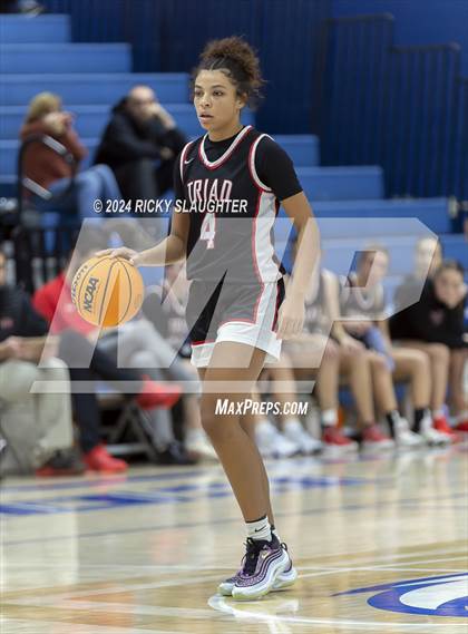 Thumbnail 2 in Triad vs Marquette Catholic (Columbia Tip Off Tournament) photogallery.