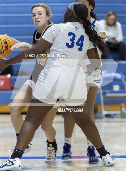 Thumbnail 1 in Triad vs Marquette Catholic (Columbia Tip Off Tournament) photogallery.