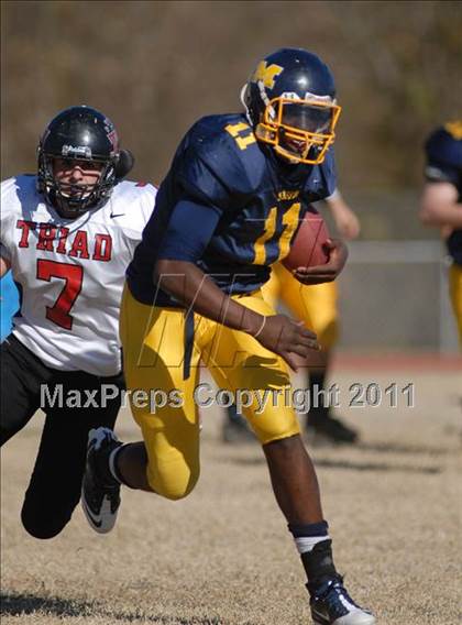 Thumbnail 1 in Triad @ Marion (IHSA Class 5A Playoffs - First Round) photogallery.