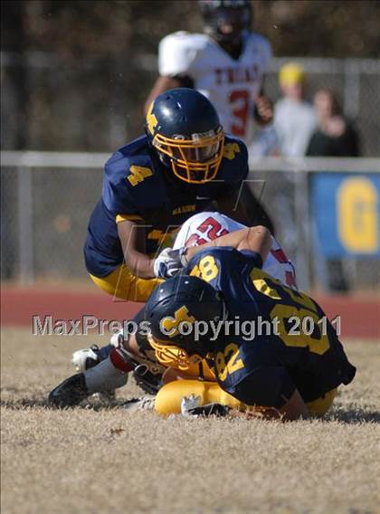 Thumbnail 2 in Triad @ Marion (IHSA Class 5A Playoffs - First Round) photogallery.