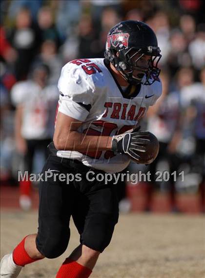 Thumbnail 2 in Triad @ Marion (IHSA Class 5A Playoffs - First Round) photogallery.