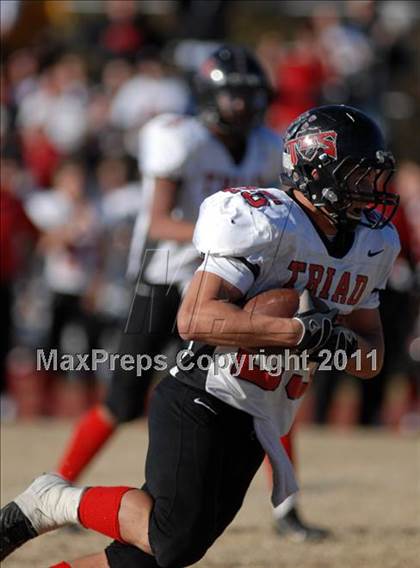 Thumbnail 1 in Triad @ Marion (IHSA Class 5A Playoffs - First Round) photogallery.