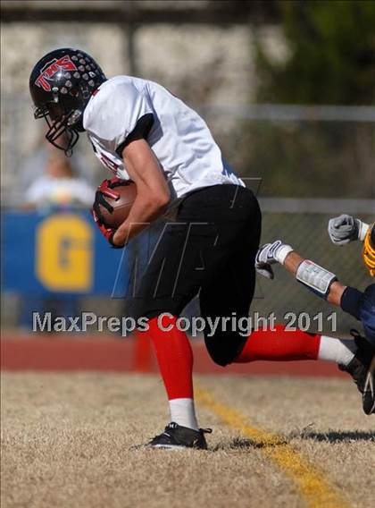 Thumbnail 1 in Triad @ Marion (IHSA Class 5A Playoffs - First Round) photogallery.
