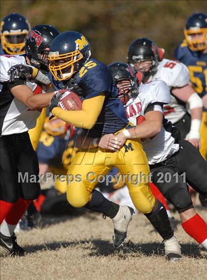 Thumbnail 1 in Triad @ Marion (IHSA Class 5A Playoffs - First Round) photogallery.