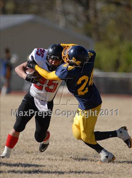 Thumbnail 3 in Triad @ Marion (IHSA Class 5A Playoffs - First Round) photogallery.