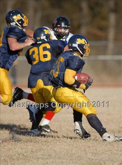 Thumbnail 1 in Triad @ Marion (IHSA Class 5A Playoffs - First Round) photogallery.