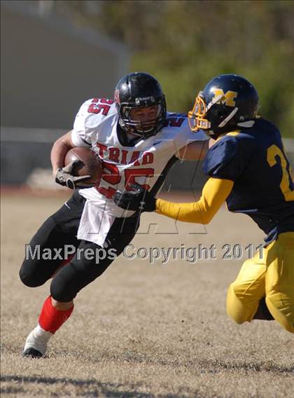 Thumbnail 2 in Triad @ Marion (IHSA Class 5A Playoffs - First Round) photogallery.