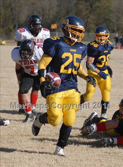 Thumbnail 2 in Triad @ Marion (IHSA Class 5A Playoffs - First Round) photogallery.
