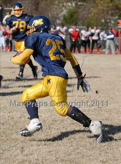 Thumbnail 3 in Triad @ Marion (IHSA Class 5A Playoffs - First Round) photogallery.