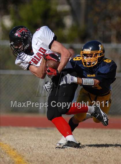 Thumbnail 3 in Triad @ Marion (IHSA Class 5A Playoffs - First Round) photogallery.