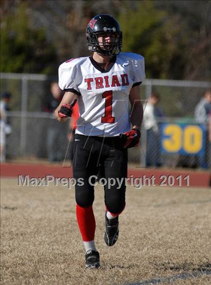 Thumbnail 2 in Triad @ Marion (IHSA Class 5A Playoffs - First Round) photogallery.