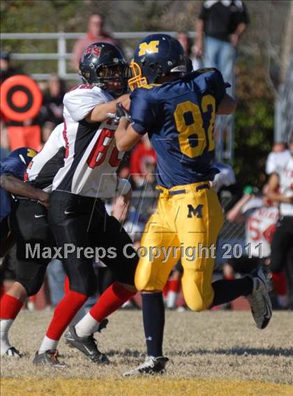 Thumbnail 2 in Triad @ Marion (IHSA Class 5A Playoffs - First Round) photogallery.