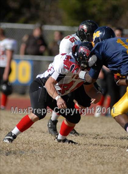 Thumbnail 2 in Triad @ Marion (IHSA Class 5A Playoffs - First Round) photogallery.