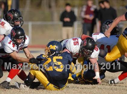 Thumbnail 3 in Triad @ Marion (IHSA Class 5A Playoffs - First Round) photogallery.