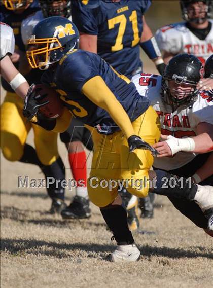 Thumbnail 3 in Triad @ Marion (IHSA Class 5A Playoffs - First Round) photogallery.