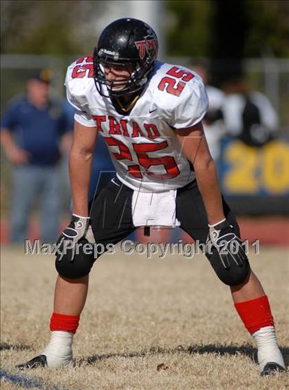 Thumbnail 1 in Triad @ Marion (IHSA Class 5A Playoffs - First Round) photogallery.