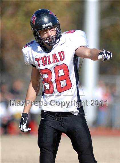 Thumbnail 1 in Triad @ Marion (IHSA Class 5A Playoffs - First Round) photogallery.