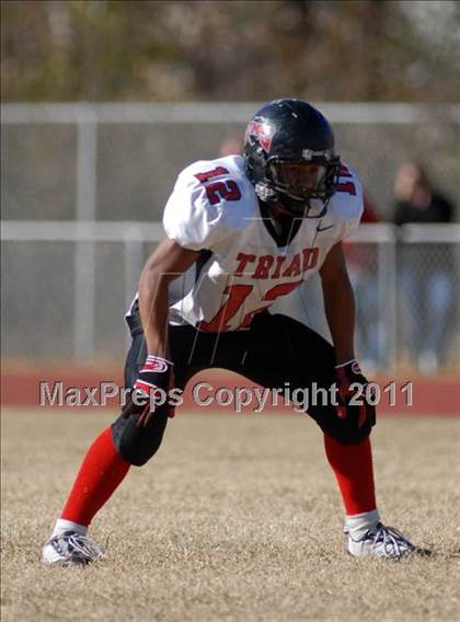 Thumbnail 3 in Triad @ Marion (IHSA Class 5A Playoffs - First Round) photogallery.