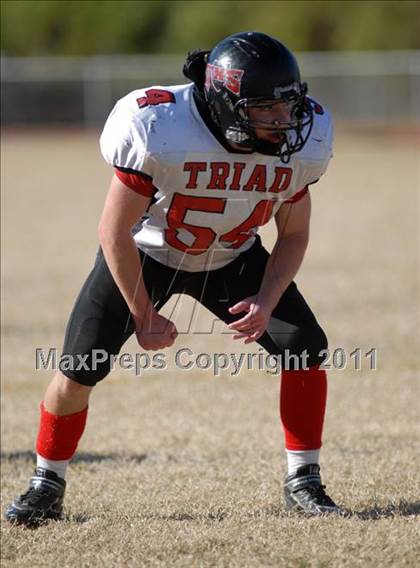 Thumbnail 1 in Triad @ Marion (IHSA Class 5A Playoffs - First Round) photogallery.