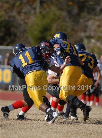 Thumbnail 3 in Triad @ Marion (IHSA Class 5A Playoffs - First Round) photogallery.