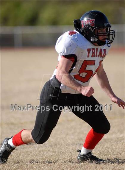 Thumbnail 2 in Triad @ Marion (IHSA Class 5A Playoffs - First Round) photogallery.