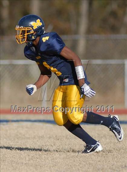 Thumbnail 3 in Triad @ Marion (IHSA Class 5A Playoffs - First Round) photogallery.