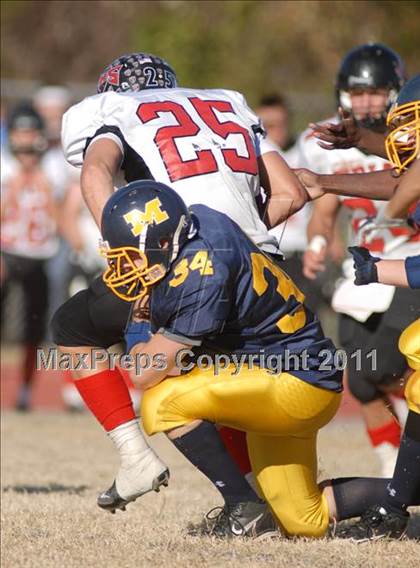 Thumbnail 2 in Triad @ Marion (IHSA Class 5A Playoffs - First Round) photogallery.