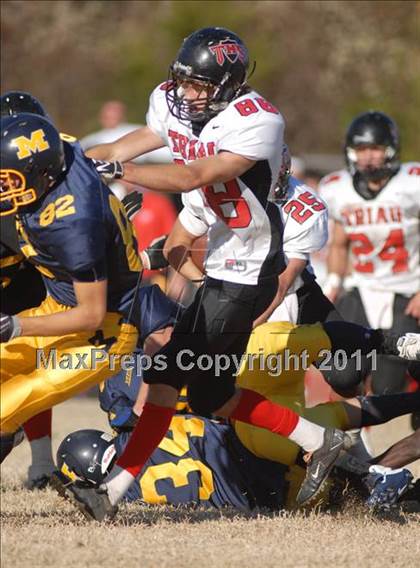 Thumbnail 3 in Triad @ Marion (IHSA Class 5A Playoffs - First Round) photogallery.