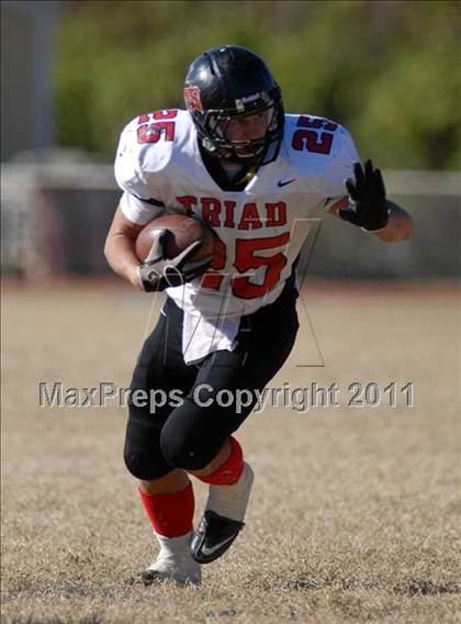 Thumbnail 1 in Triad @ Marion (IHSA Class 5A Playoffs - First Round) photogallery.