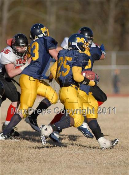 Thumbnail 3 in Triad @ Marion (IHSA Class 5A Playoffs - First Round) photogallery.