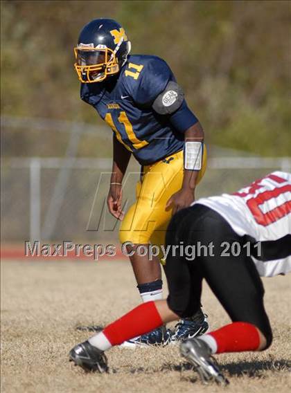 Thumbnail 3 in Triad @ Marion (IHSA Class 5A Playoffs - First Round) photogallery.