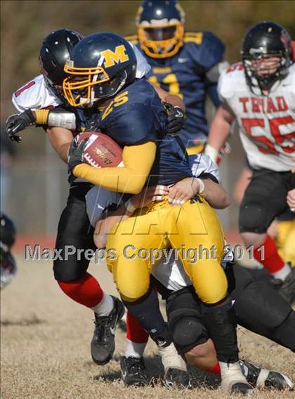 Thumbnail 2 in Triad @ Marion (IHSA Class 5A Playoffs - First Round) photogallery.