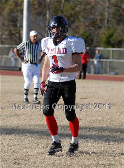 Thumbnail 3 in Triad @ Marion (IHSA Class 5A Playoffs - First Round) photogallery.