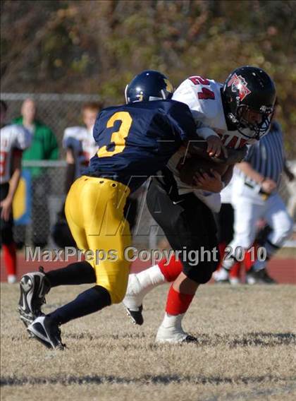Thumbnail 3 in Triad @ Marion (IHSA Class 5A Playoffs - First Round) photogallery.