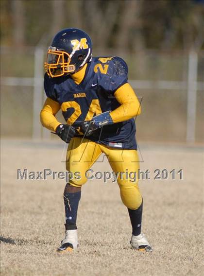 Thumbnail 3 in Triad @ Marion (IHSA Class 5A Playoffs - First Round) photogallery.