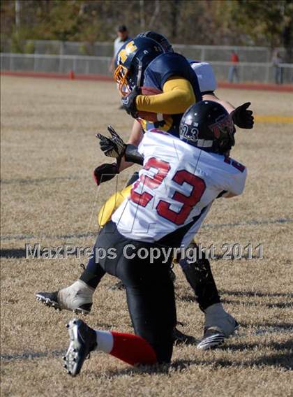 Thumbnail 2 in Triad @ Marion (IHSA Class 5A Playoffs - First Round) photogallery.