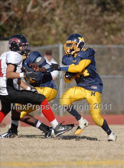 Thumbnail 3 in Triad @ Marion (IHSA Class 5A Playoffs - First Round) photogallery.