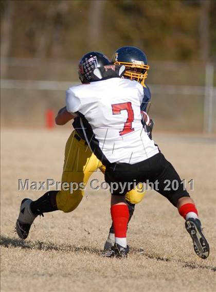 Thumbnail 2 in Triad @ Marion (IHSA Class 5A Playoffs - First Round) photogallery.