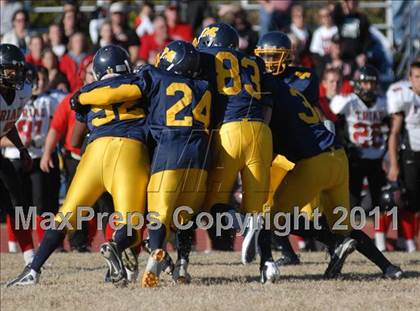 Thumbnail 3 in Triad @ Marion (IHSA Class 5A Playoffs - First Round) photogallery.