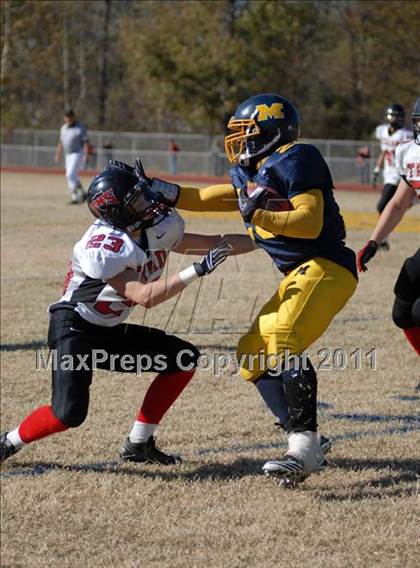 Thumbnail 3 in Triad @ Marion (IHSA Class 5A Playoffs - First Round) photogallery.