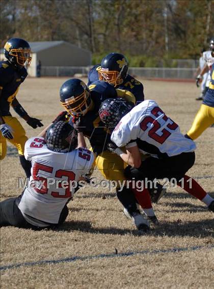 Thumbnail 3 in Triad @ Marion (IHSA Class 5A Playoffs - First Round) photogallery.