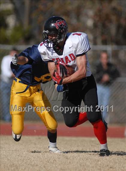 Thumbnail 2 in Triad @ Marion (IHSA Class 5A Playoffs - First Round) photogallery.