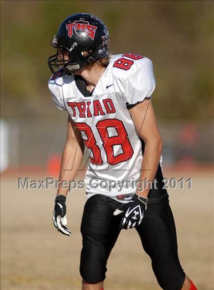 Thumbnail 1 in Triad @ Marion (IHSA Class 5A Playoffs - First Round) photogallery.
